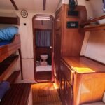 cabin berth in the catamaran, made of fine wood
